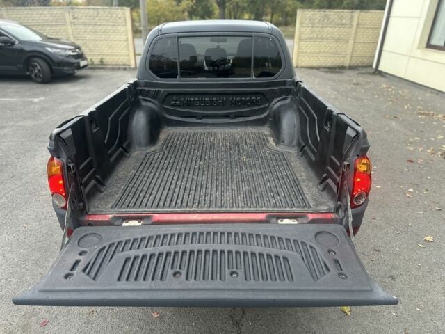 Мицубиси Л 200 2012 в Днепре (Днепропетровске) на Automoto.ua Серый Мицубиси Л 200, объемом двигателя 2.5 л и пробегом 125 тыс. км за 7850 $, фото 12 на Automoto.ua