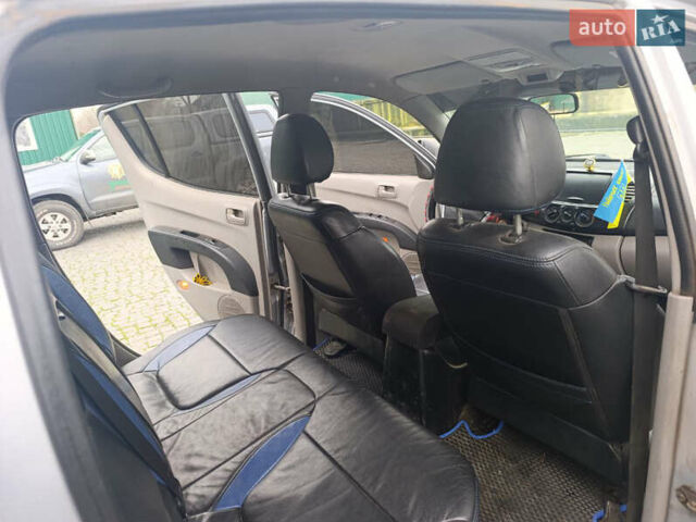 Серый Мицубиси Л 200, объемом двигателя 2.48 л и пробегом 299 тыс. км за 13900 $, фото 8 на Automoto.ua