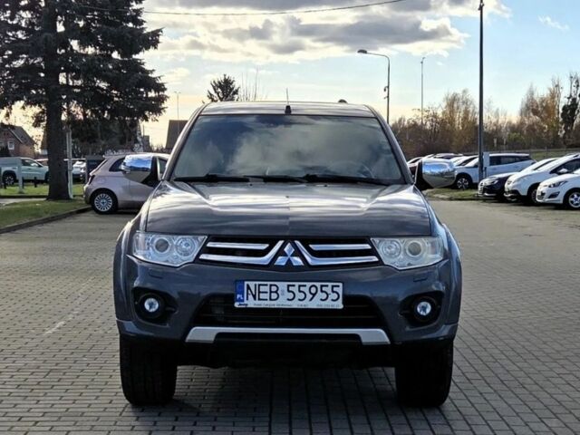 Серый Мицубиси Л 200, объемом двигателя 2.5 л и пробегом 130 тыс. км за 5222 $, фото 2 на Automoto.ua