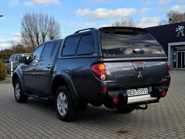 Серый Мицубиси Л 200, объемом двигателя 2.5 л и пробегом 130 тыс. км за 5222 $, фото 4 на Automoto.ua