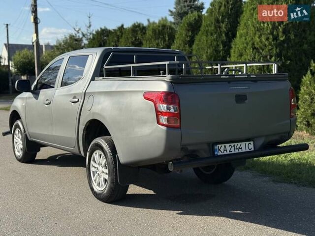 Серый Мицубиси Л 200, объемом двигателя 2.44 л и пробегом 160 тыс. км за 19999 $, фото 5 на Automoto.ua