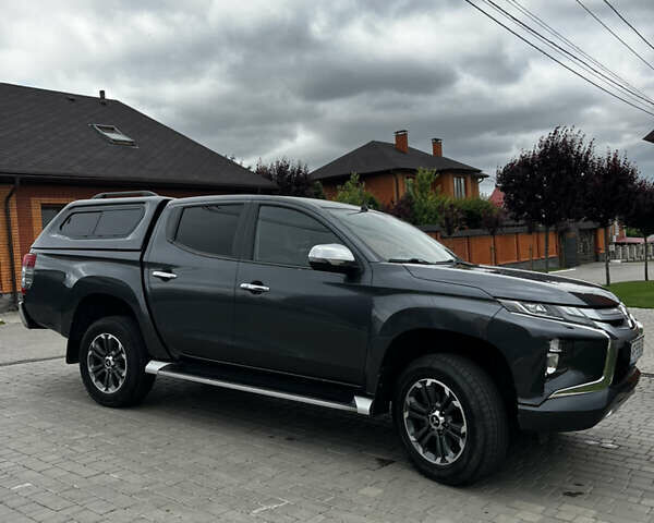 Сірий Міцубісі Л 200, об'ємом двигуна 2.44 л та пробігом 157 тис. км за 30300 $, фото 4 на Automoto.ua