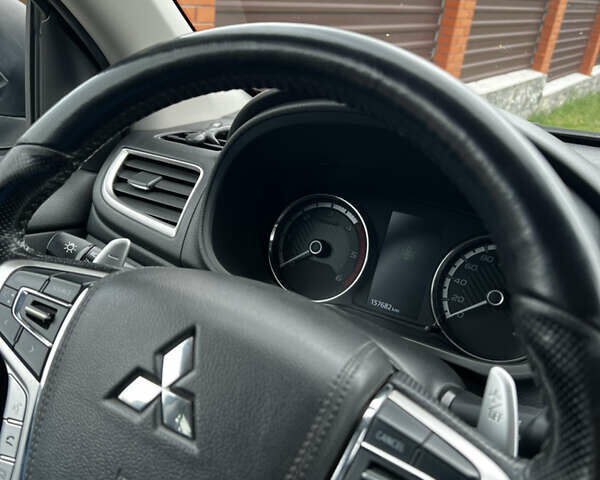 Сірий Міцубісі Л 200, об'ємом двигуна 2.44 л та пробігом 157 тис. км за 30300 $, фото 11 на Automoto.ua