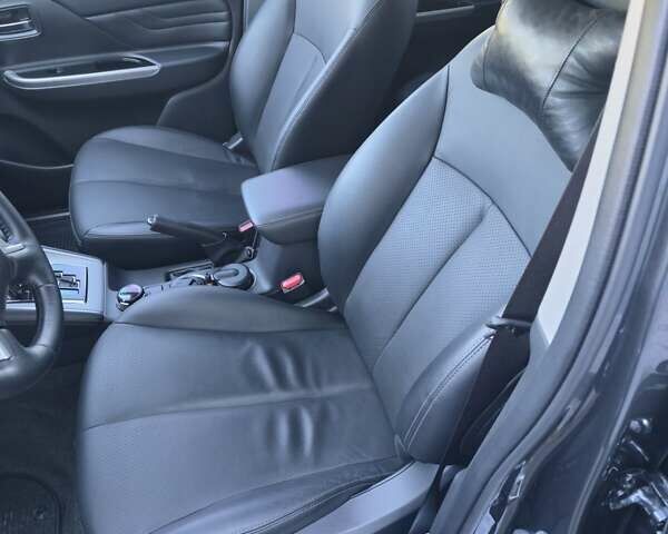 Серый Мицубиси Л 200, объемом двигателя 2.44 л и пробегом 4 тыс. км за 44400 $, фото 20 на Automoto.ua