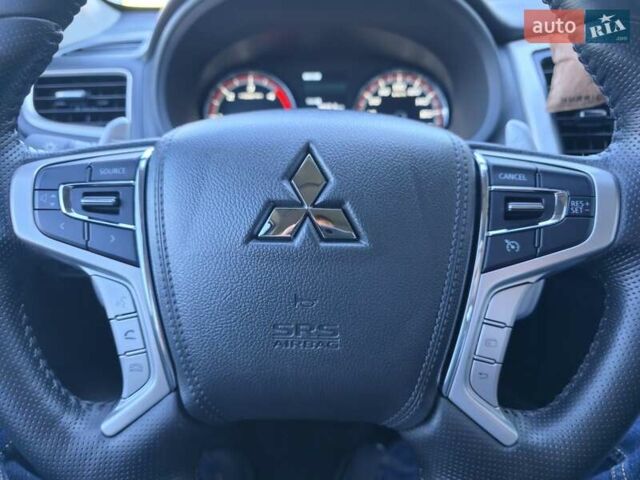 Серый Мицубиси Л 200, объемом двигателя 2.44 л и пробегом 4 тыс. км за 44400 $, фото 30 на Automoto.ua