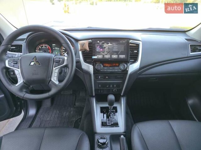 Серый Мицубиси Л 200, объемом двигателя 2.44 л и пробегом 4 тыс. км за 44400 $, фото 22 на Automoto.ua