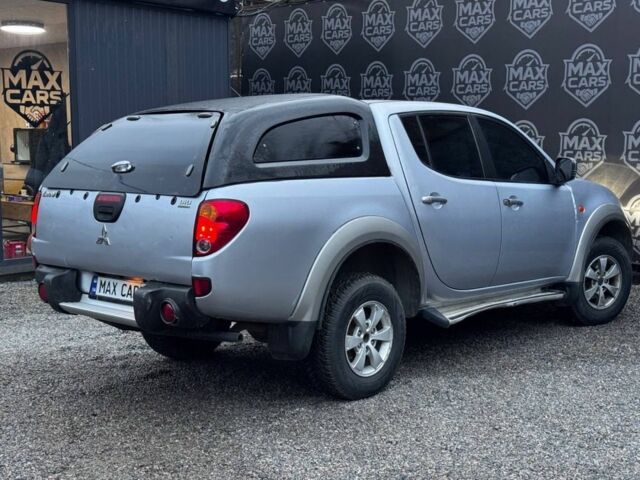 Серый Мицубиси Л 200, объемом двигателя 2.5 л и пробегом 260 тыс. км за 9900 $, фото 3 на Automoto.ua