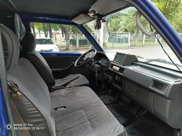 Синій Міцубісі Л 200, об'ємом двигуна 2 л та пробігом 400 тис. км за 3100 $, фото 4 на Automoto.ua