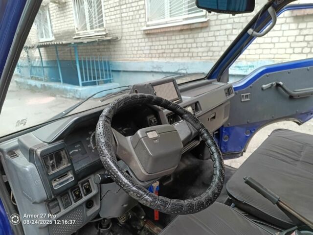 Синій Міцубісі Л 200, об'ємом двигуна 2 л та пробігом 400 тис. км за 3100 $, фото 5 на Automoto.ua