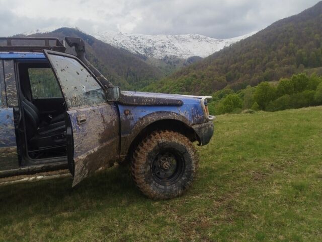 Синий Мицубиси Л 200, объемом двигателя 0 л и пробегом 334 тыс. км за 4350 $, фото 4 на Automoto.ua