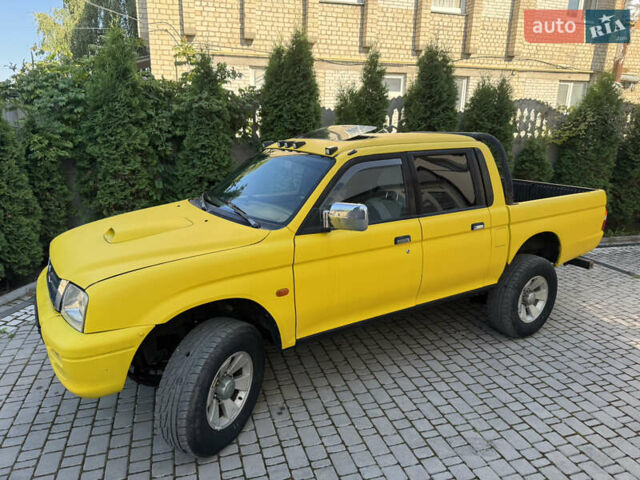 Синій Міцубісі Л 200, об'ємом двигуна 0 л та пробігом 300 тис. км за 6296 $, фото 3 на Automoto.ua
