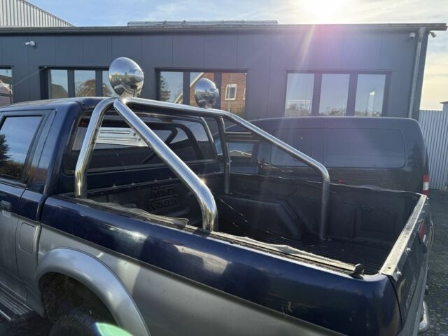 Синий Мицубиси Л 200, объемом двигателя 2.5 л и пробегом 270 тыс. км за 3583 $, фото 6 на Automoto.ua