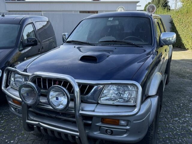 Синий Мицубиси Л 200, объемом двигателя 2.5 л и пробегом 270 тыс. км за 3583 $, фото 4 на Automoto.ua