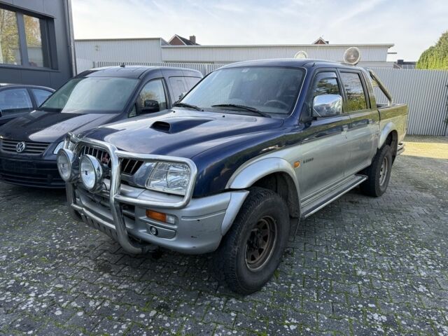 Синий Мицубиси Л 200, объемом двигателя 2.5 л и пробегом 270 тыс. км за 3583 $, фото 3 на Automoto.ua