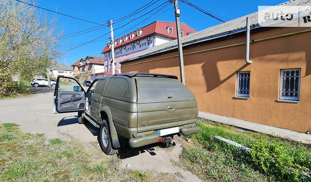 Синій Міцубісі Л 200, об'ємом двигуна 2.48 л та пробігом 172 тис. км за 10000 $, фото 6 на Automoto.ua