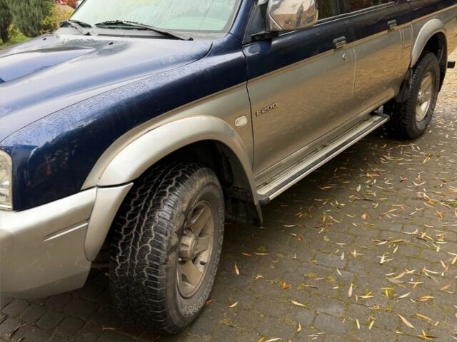 Синій Міцубісі Л 200, об'ємом двигуна 0 л та пробігом 211 тис. км за 2600 $, фото 2 на Automoto.ua