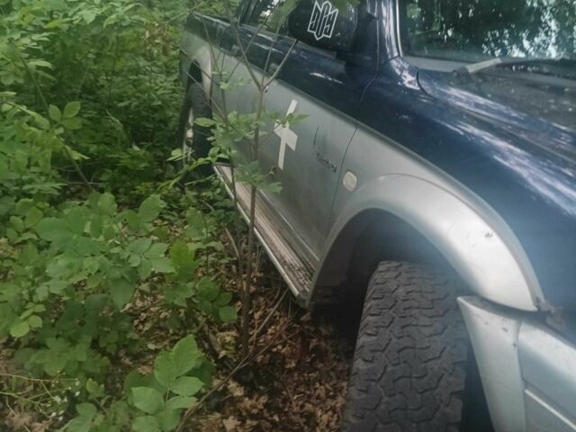 Синій Міцубісі Л 200, об'ємом двигуна 2.5 л та пробігом 290 тис. км за 4300 $, фото 7 на Automoto.ua