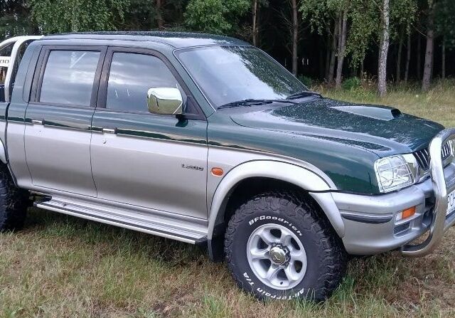 Синій Міцубісі Л 200, об'ємом двигуна 0 л та пробігом 240 тис. км за 2600 $, фото 4 на Automoto.ua