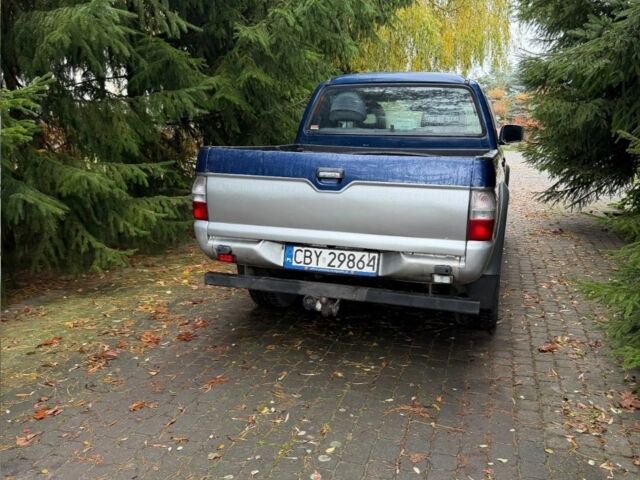 Синій Міцубісі Л 200, об'ємом двигуна 0 л та пробігом 211 тис. км за 2600 $, фото 1 на Automoto.ua