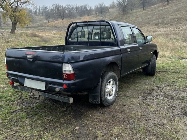 Синій Міцубісі Л 200, об'ємом двигуна 2.5 л та пробігом 321 тис. км за 4455 $, фото 3 на Automoto.ua