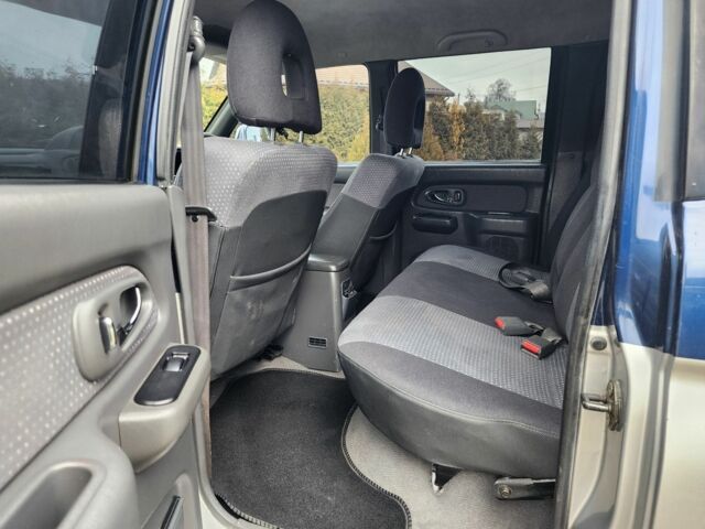 Синій Міцубісі Л 200, об'ємом двигуна 2.5 л та пробігом 105 тис. км за 7574 $, фото 20 на Automoto.ua