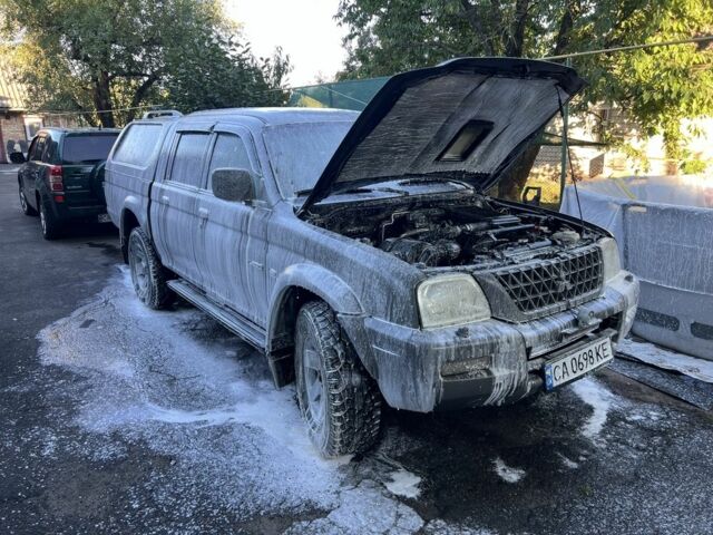 Синій Міцубісі Л 200, об'ємом двигуна 2.5 л та пробігом 347 тис. км за 10213 $, фото 6 на Automoto.ua