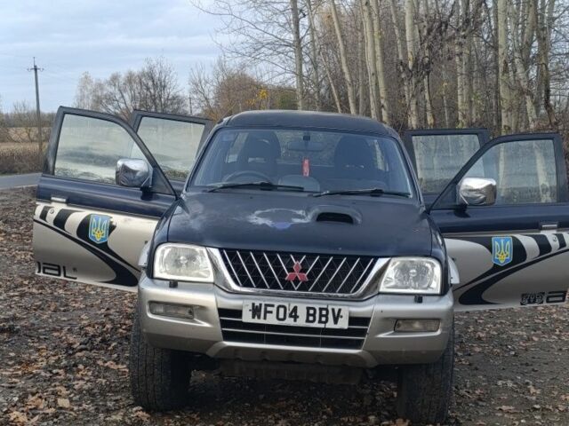 Синій Міцубісі Л 200, об'ємом двигуна 2.5 л та пробігом 276 тис. км за 5300 $, фото 5 на Automoto.ua