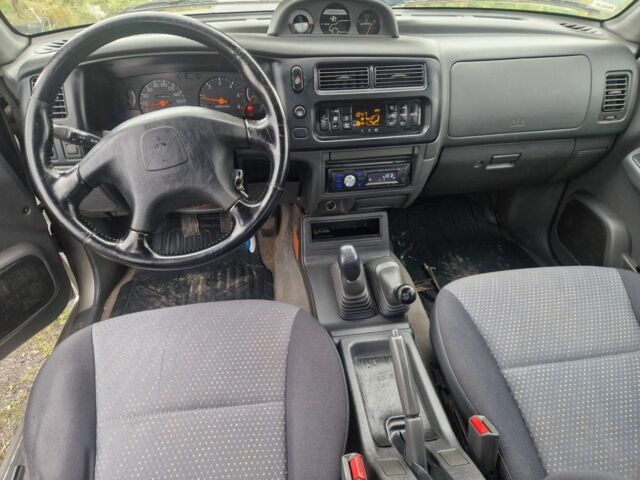 Синій Міцубісі Л 200, об'ємом двигуна 2.5 л та пробігом 250 тис. км за 6528 $, фото 9 на Automoto.ua