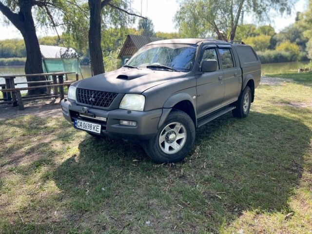 Синій Міцубісі Л 200, об'ємом двигуна 2.5 л та пробігом 347 тис. км за 10213 $, фото 17 на Automoto.ua