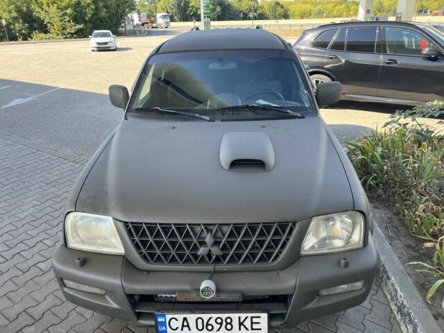 Синій Міцубісі Л 200, об'ємом двигуна 2.5 л та пробігом 347 тис. км за 10213 $, фото 16 на Automoto.ua