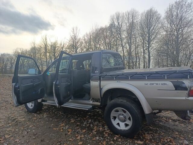 Синій Міцубісі Л 200, об'ємом двигуна 2.5 л та пробігом 276 тис. км за 5300 $, фото 15 на Automoto.ua