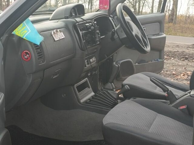 Синій Міцубісі Л 200, об'ємом двигуна 2.5 л та пробігом 276 тис. км за 5300 $, фото 7 на Automoto.ua