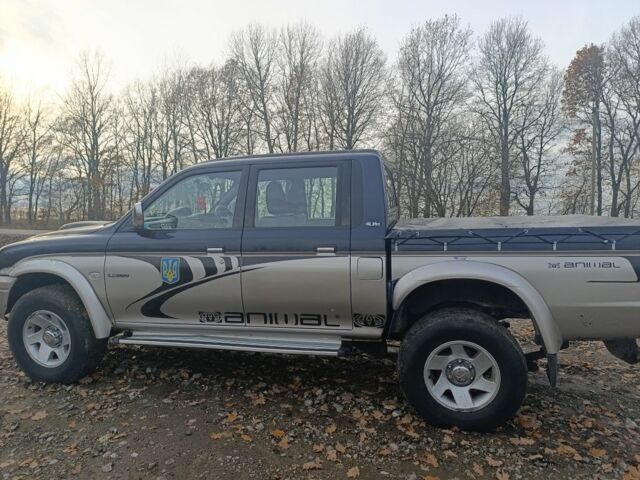 Синій Міцубісі Л 200, об'ємом двигуна 2.5 л та пробігом 276 тис. км за 5300 $, фото 12 на Automoto.ua