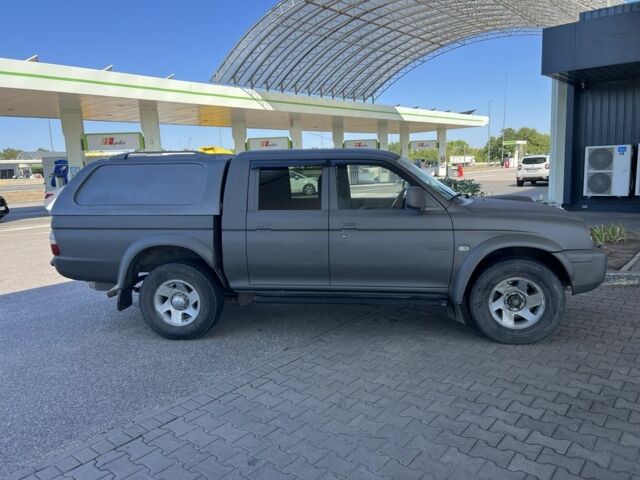 Синій Міцубісі Л 200, об'ємом двигуна 2.5 л та пробігом 347 тис. км за 10213 $, фото 9 на Automoto.ua