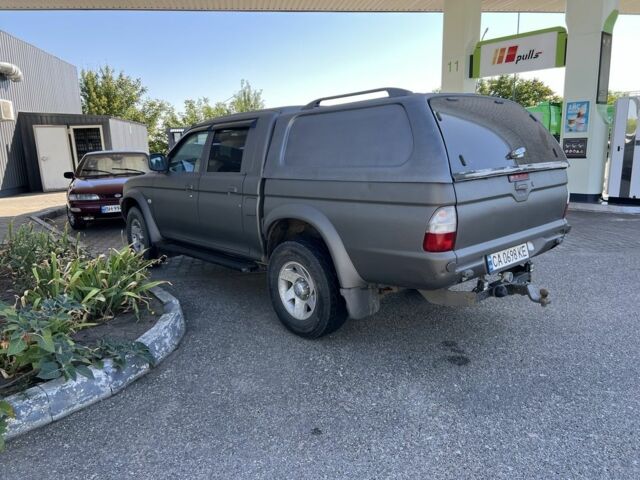 Синій Міцубісі Л 200, об'ємом двигуна 2.5 л та пробігом 347 тис. км за 10213 $, фото 11 на Automoto.ua