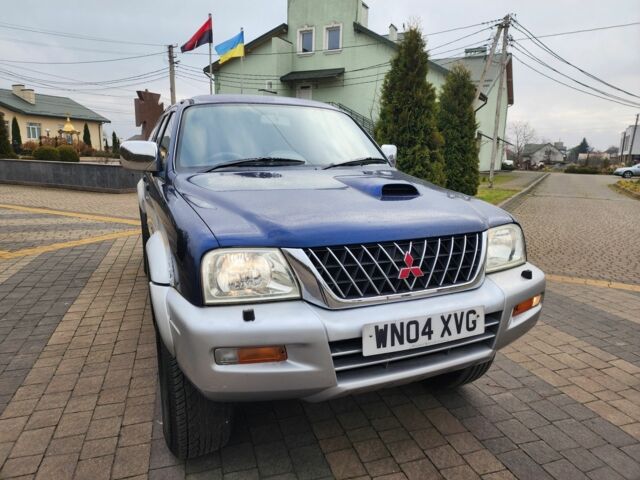 Синій Міцубісі Л 200, об'ємом двигуна 2.5 л та пробігом 105 тис. км за 7574 $, фото 4 на Automoto.ua