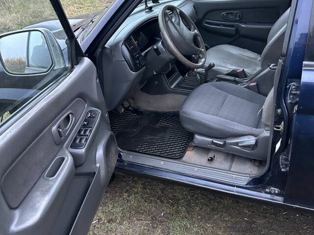 Синій Міцубісі Л 200, об'ємом двигуна 2.5 л та пробігом 321 тис. км за 4455 $, фото 6 на Automoto.ua