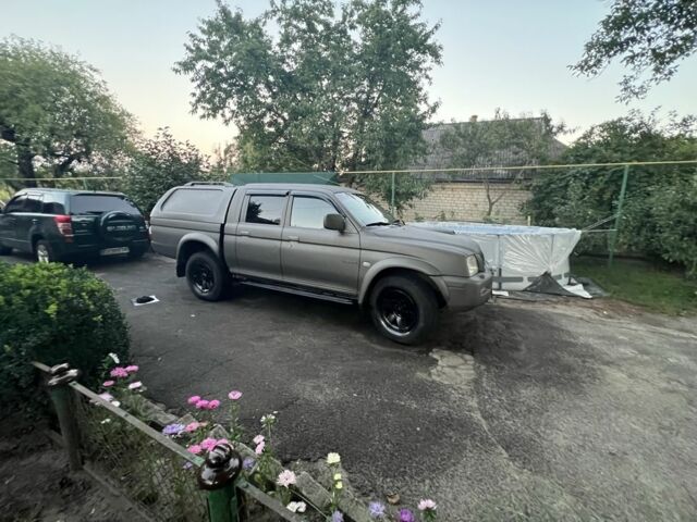 Синій Міцубісі Л 200, об'ємом двигуна 2.5 л та пробігом 347 тис. км за 10213 $, фото 18 на Automoto.ua