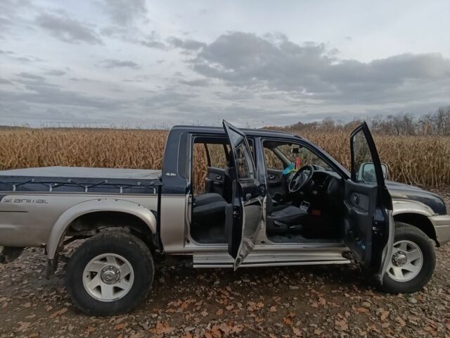 Синій Міцубісі Л 200, об'ємом двигуна 2.5 л та пробігом 276 тис. км за 5300 $, фото 3 на Automoto.ua