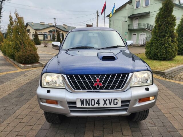 Синій Міцубісі Л 200, об'ємом двигуна 2.5 л та пробігом 105 тис. км за 7574 $, фото 5 на Automoto.ua