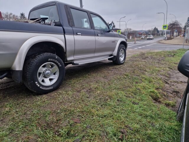 Синій Міцубісі Л 200, об'ємом двигуна 2.5 л та пробігом 250 тис. км за 6528 $, фото 4 на Automoto.ua