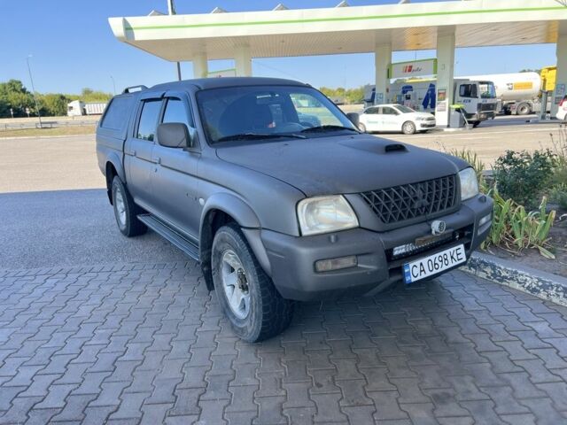 Синій Міцубісі Л 200, об'ємом двигуна 2.5 л та пробігом 347 тис. км за 10213 $, фото 12 на Automoto.ua