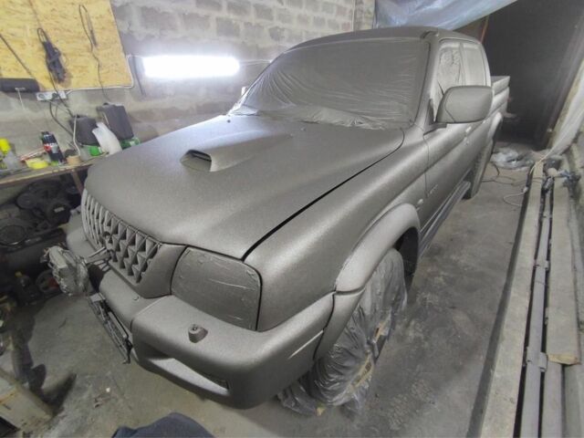 Синій Міцубісі Л 200, об'ємом двигуна 2.5 л та пробігом 347 тис. км за 10213 $, фото 14 на Automoto.ua