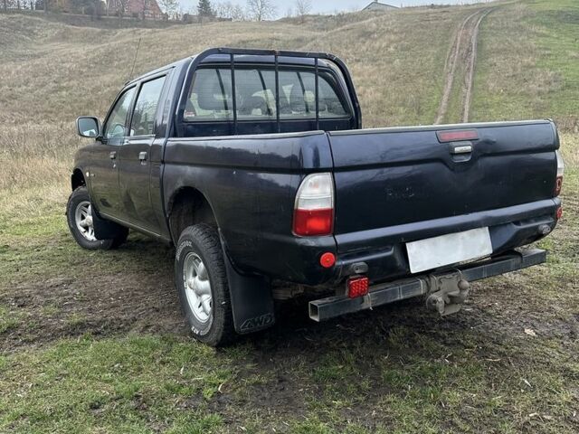 Синій Міцубісі Л 200, об'ємом двигуна 2.5 л та пробігом 321 тис. км за 4455 $, фото 2 на Automoto.ua