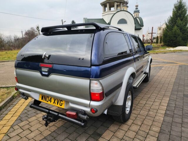 Синій Міцубісі Л 200, об'ємом двигуна 2.5 л та пробігом 105 тис. км за 7574 $, фото 11 на Automoto.ua