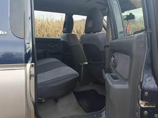 Синій Міцубісі Л 200, об'ємом двигуна 2.5 л та пробігом 276 тис. км за 5300 $, фото 10 на Automoto.ua