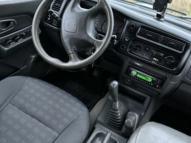 Синій Міцубісі Л 200, об'ємом двигуна 2.5 л та пробігом 321 тис. км за 4455 $, фото 10 на Automoto.ua