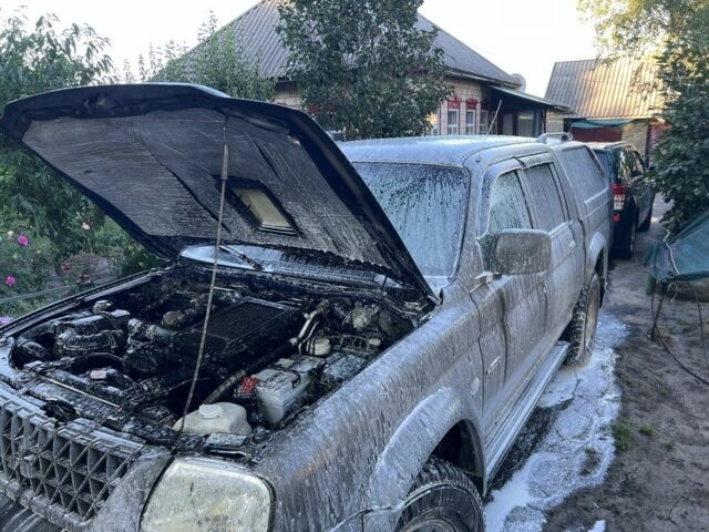 Синій Міцубісі Л 200, об'ємом двигуна 2.5 л та пробігом 347 тис. км за 10213 $, фото 19 на Automoto.ua