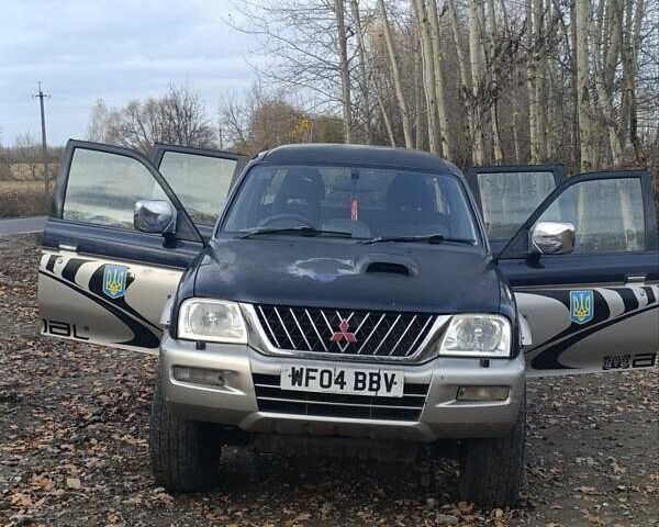 Синій Міцубісі Л 200, об'ємом двигуна 0 л та пробігом 276 тис. км за 5300 $, фото 7 на Automoto.ua