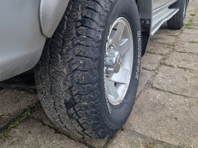 Синій Міцубісі Л 200, об'ємом двигуна 2.5 л та пробігом 250 тис. км за 6528 $, фото 5 на Automoto.ua